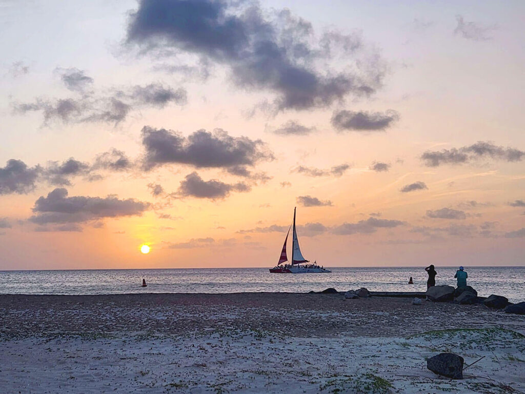 sailboat at sunset in Aruba